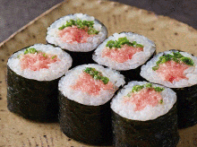 Fatty tuna and spring onion sushi rolls
