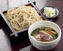 Buckwheat noodles served on a bamboo strainer