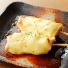Grilled skewered sasami (chicken breast tender) with cheese